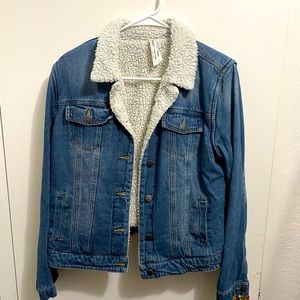 Jean jacket with fleece inside. Size L